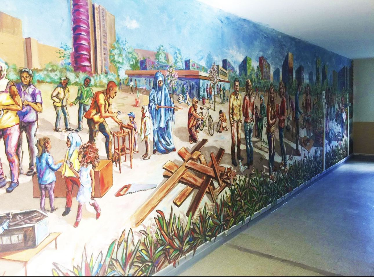 Fresque murale, scène de village réalisée par Mory